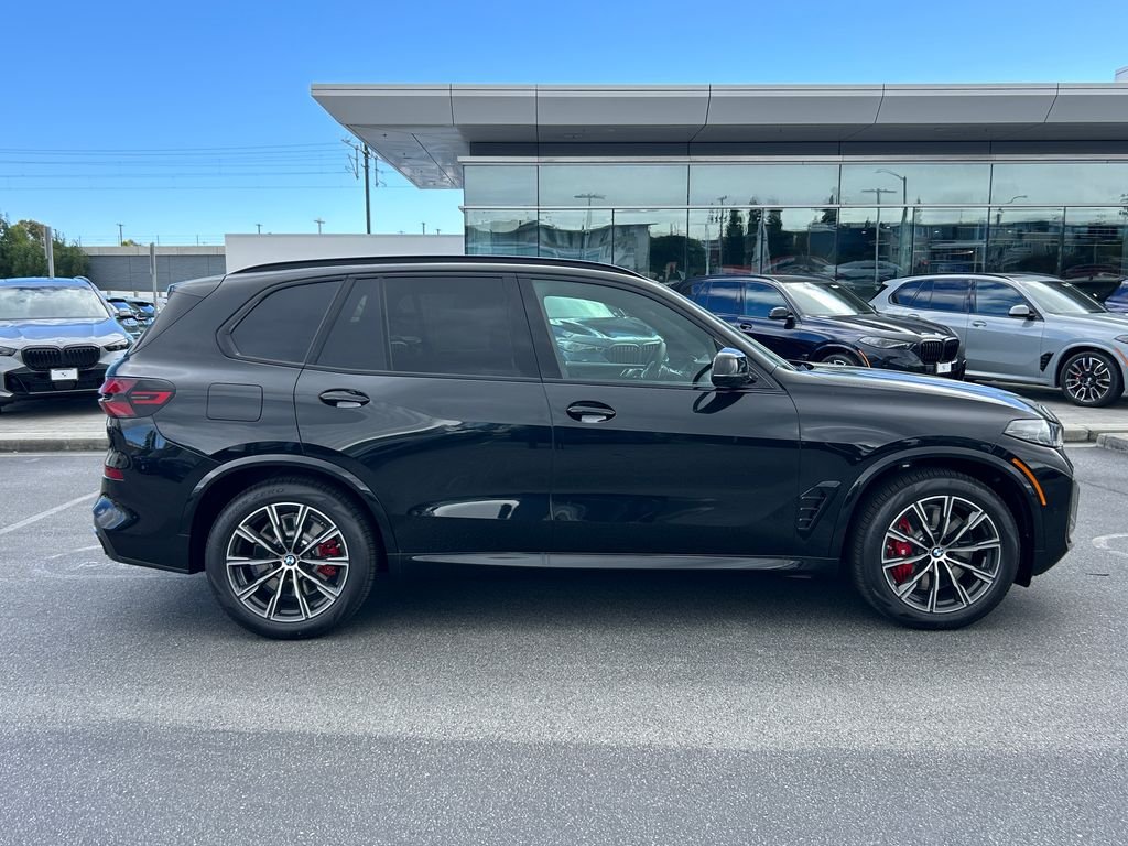 New 2026 Black Sapphire Metallic BMW xDrive50e image 6