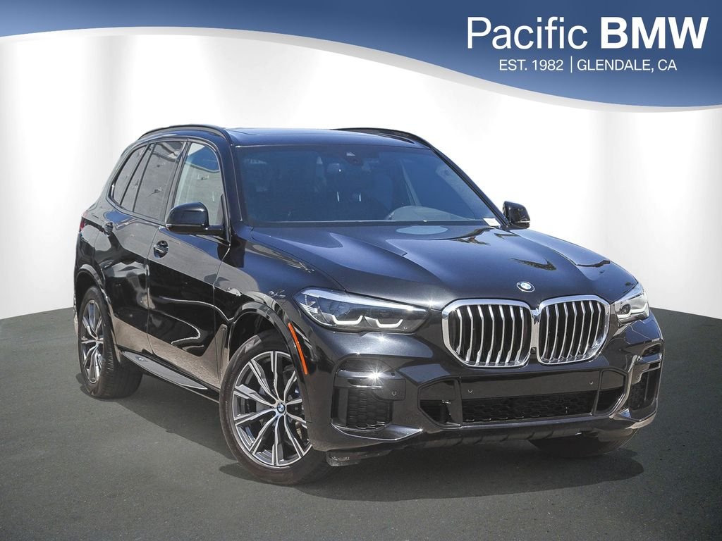 Used 2023 Black Sapphire Metallic BMW sDrive40i image 1