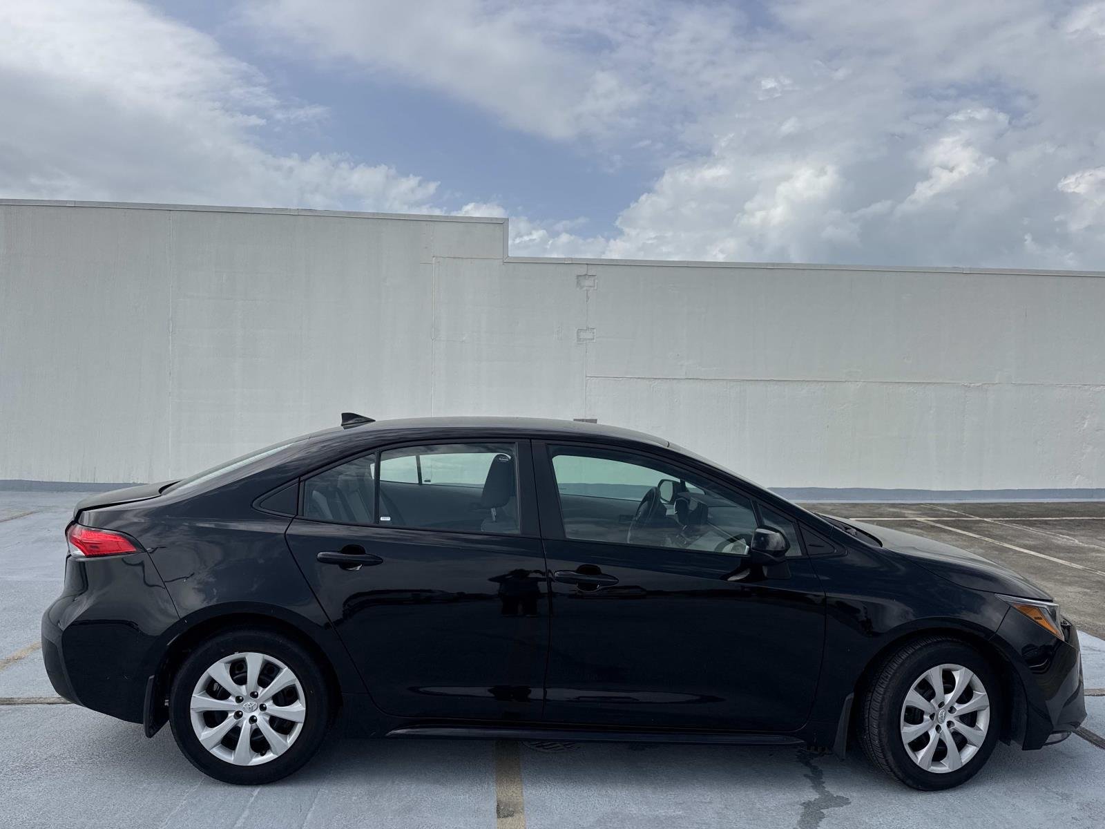 Used 2025 Midnight Black Metallic Toyota LE image 11