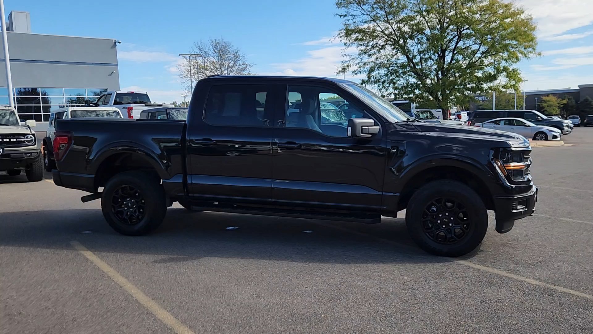 Certified Used 2024 Agate Black Metallic Ford XLT image 9