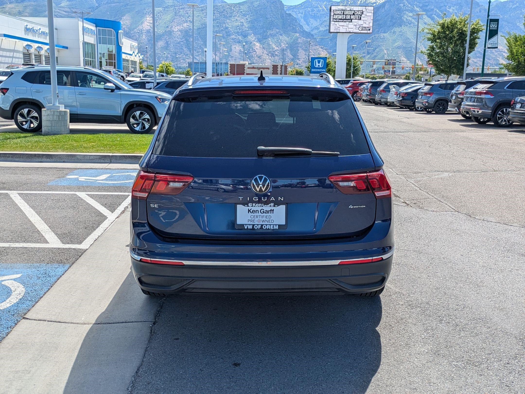 Used 2022 Atlantic Blue Metallic Volkswagen SE image 4