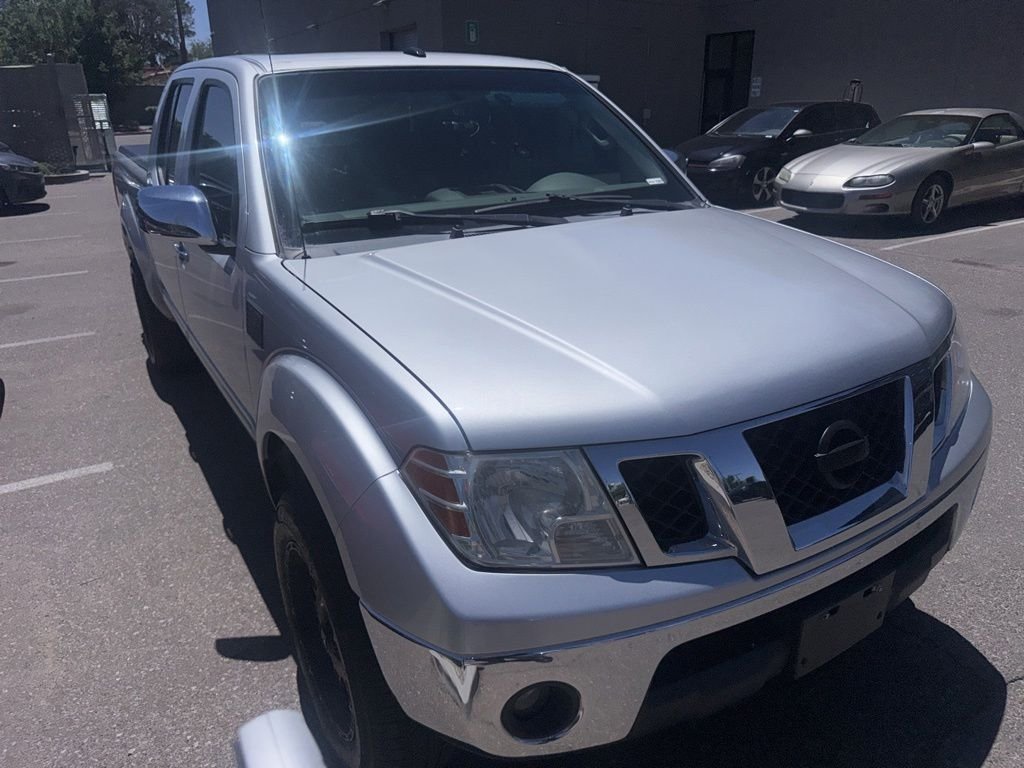 2013 Nissan Frontier 4.0 SL Crew Cab 4X4 AT LWB's photo