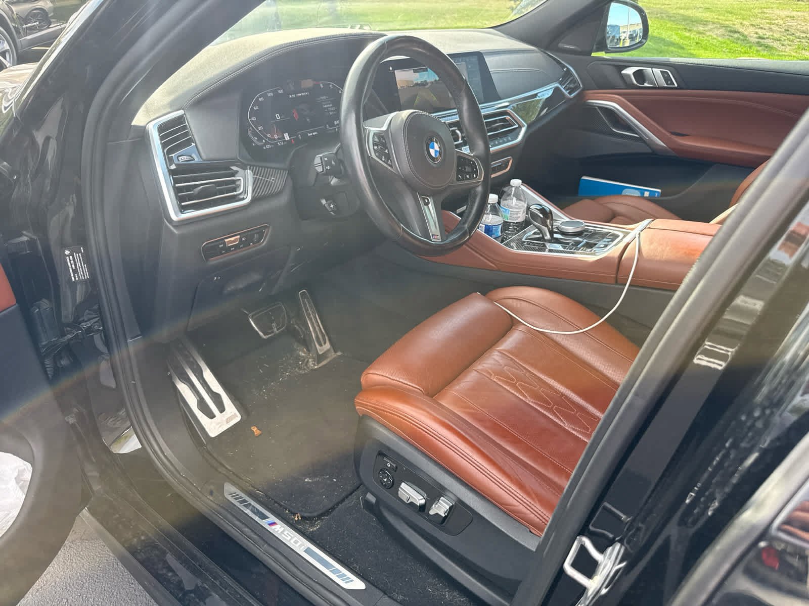 Used 2023 Black Sapphire Metallic BMW M50i image 11