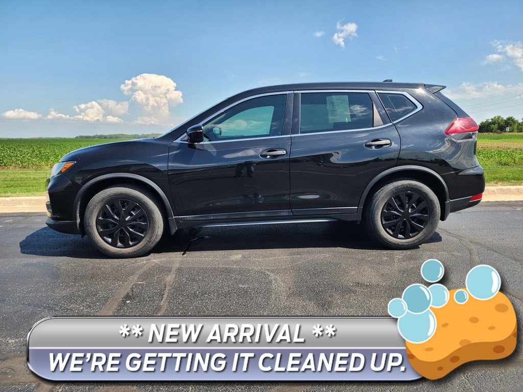 Used 2019 Magnetic Black Pearl Nissan SV image 1