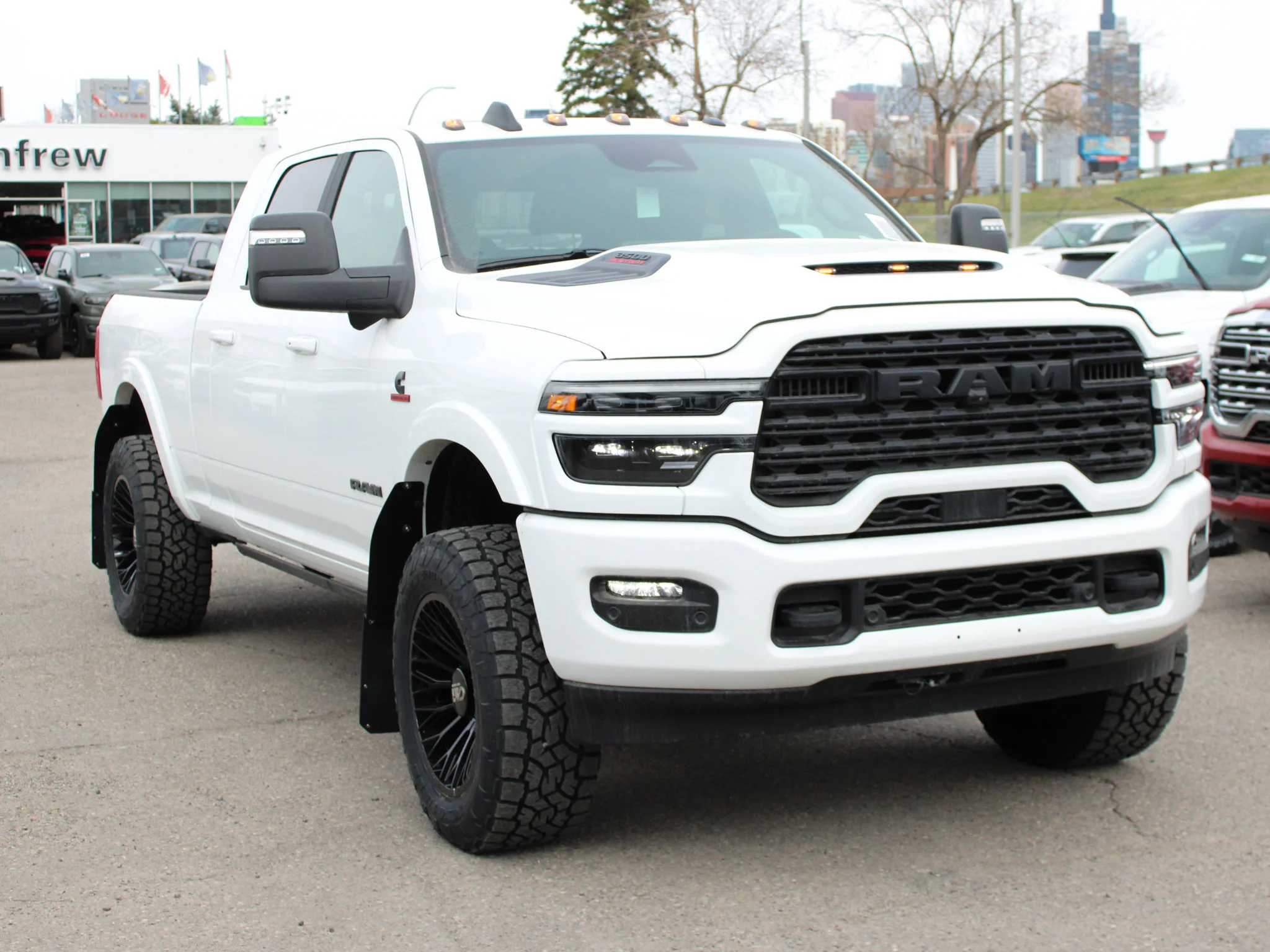 New 2026 White RAM Limited* Mega Cab, 2 Inch Lift, 35 Inch Tires, Trigger Industries Mudflaps image 11