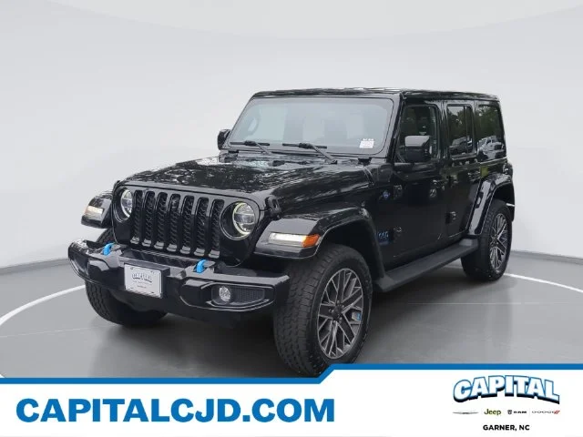 Used 2022 Black Jeep Unlimited Sahara 4xe image 1