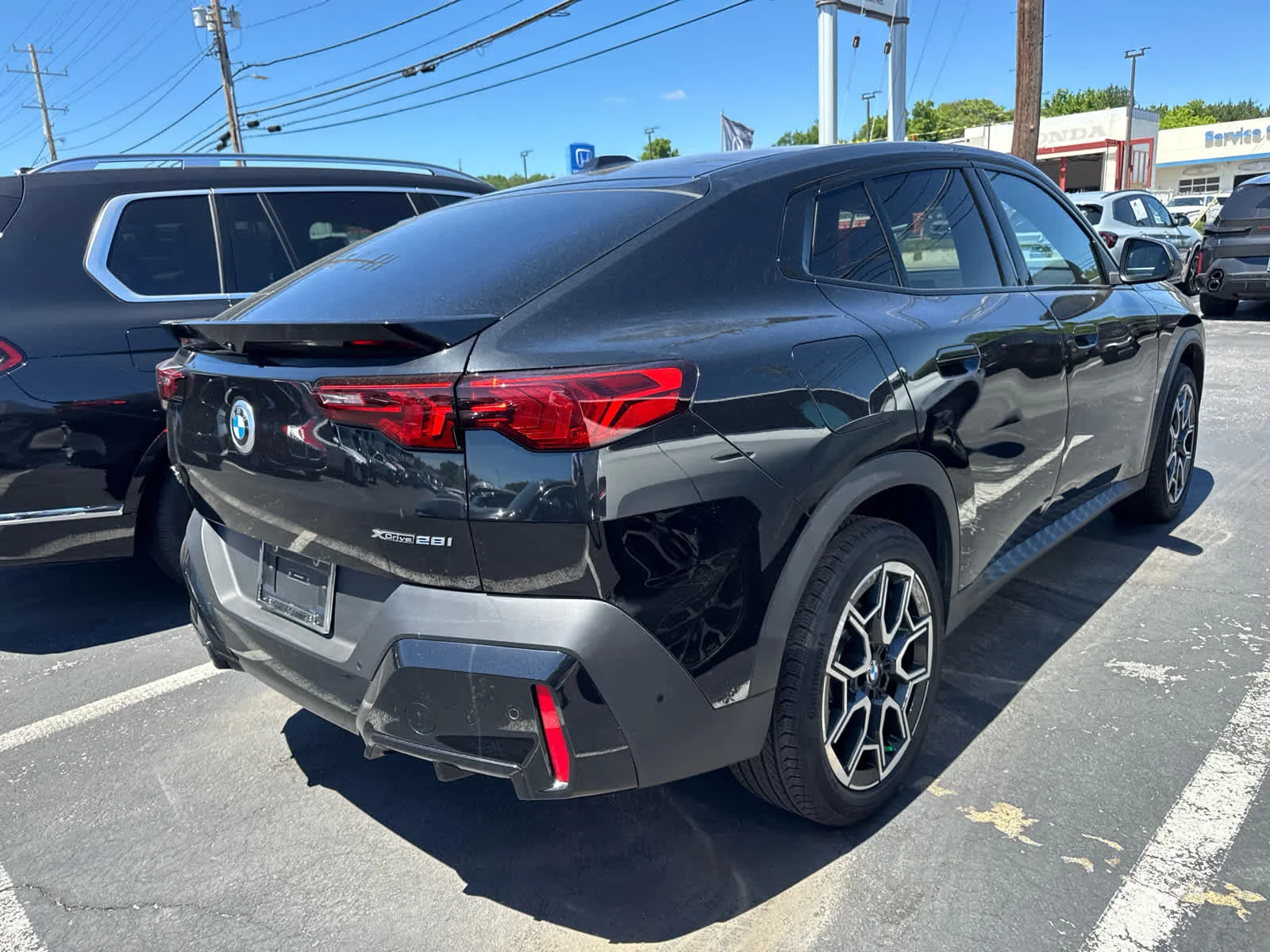 Used 2025 Black Sapphire Metallic BMW xDrive28i image 12