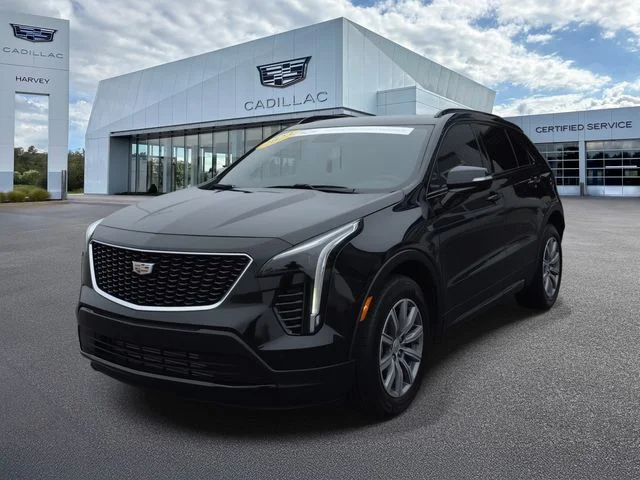 Used 2023 Black Metallic Cadillac Sport image 1