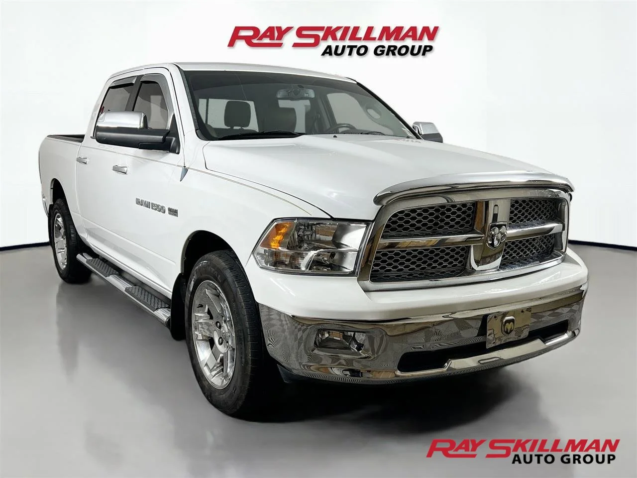 Used 2011 Bright White Ram LARAMIE LONGHORN image 1