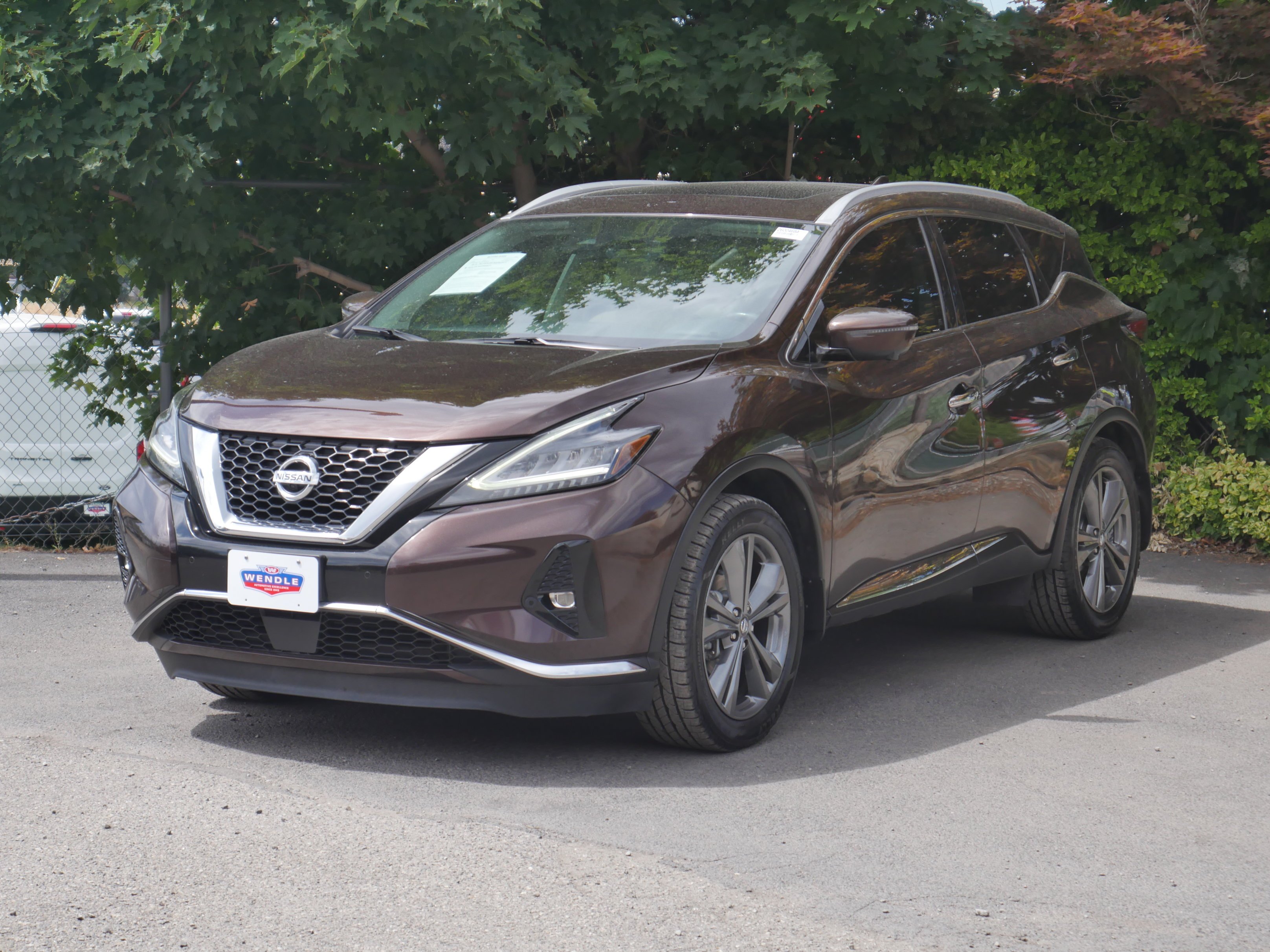Used 2019 Mocha Almond Pearl Nissan Platinum image 2