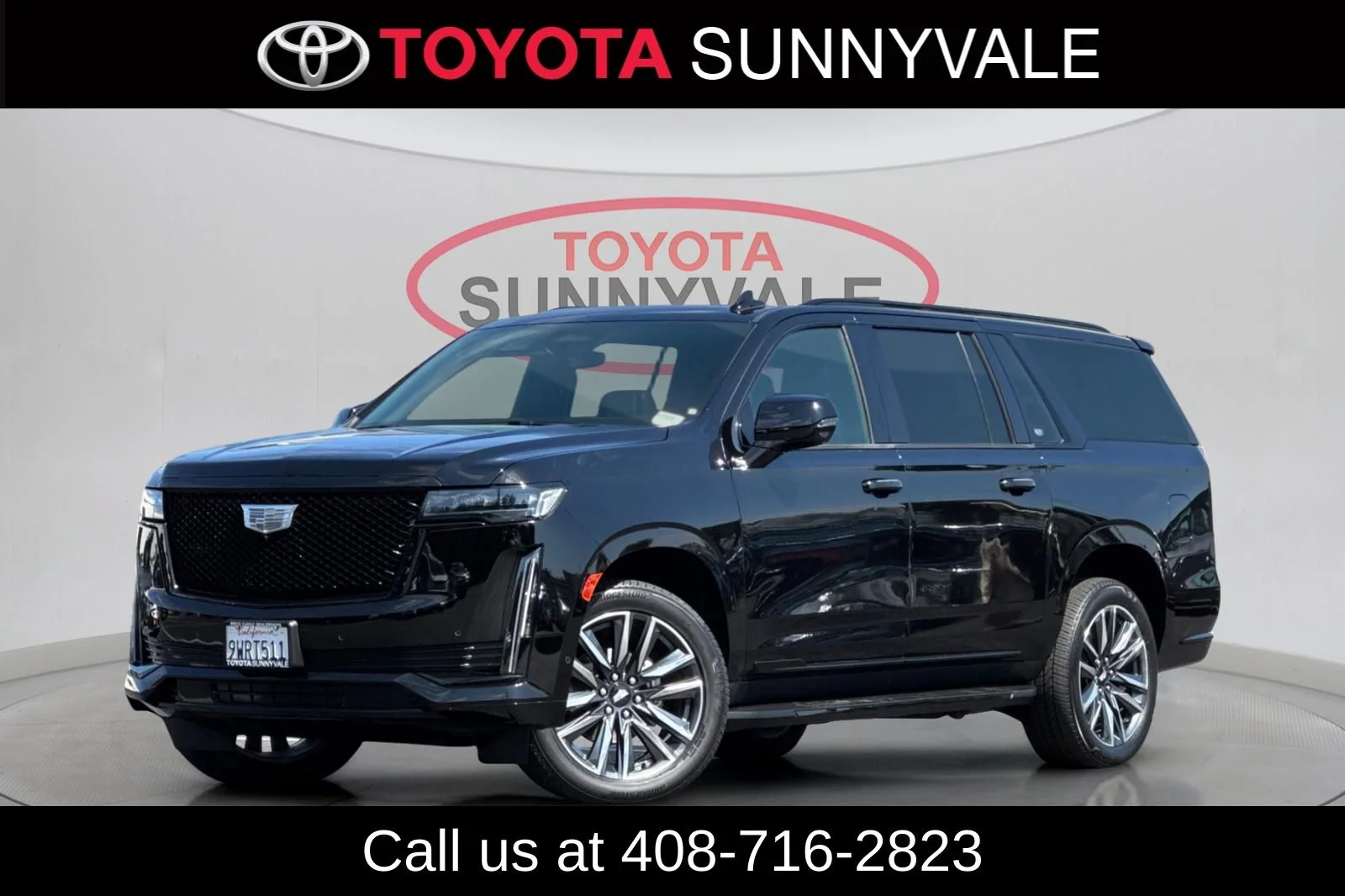 Used 2021 Black Cadillac Sport image 1