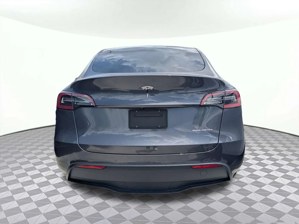 Used 2022 Tesla Model Y Long Range with VIN 7SAYGAEE1NF376923 for sale in Lake City, FL