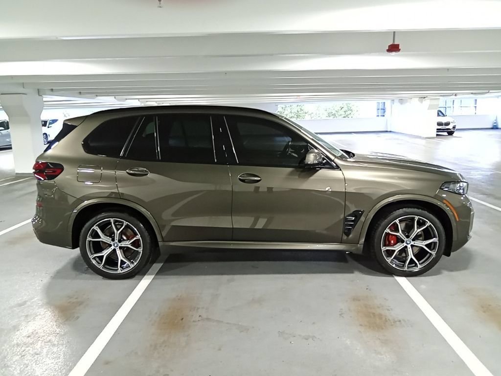 Used 2024 Manhattan Green Metallic BMW xDrive50e image 4