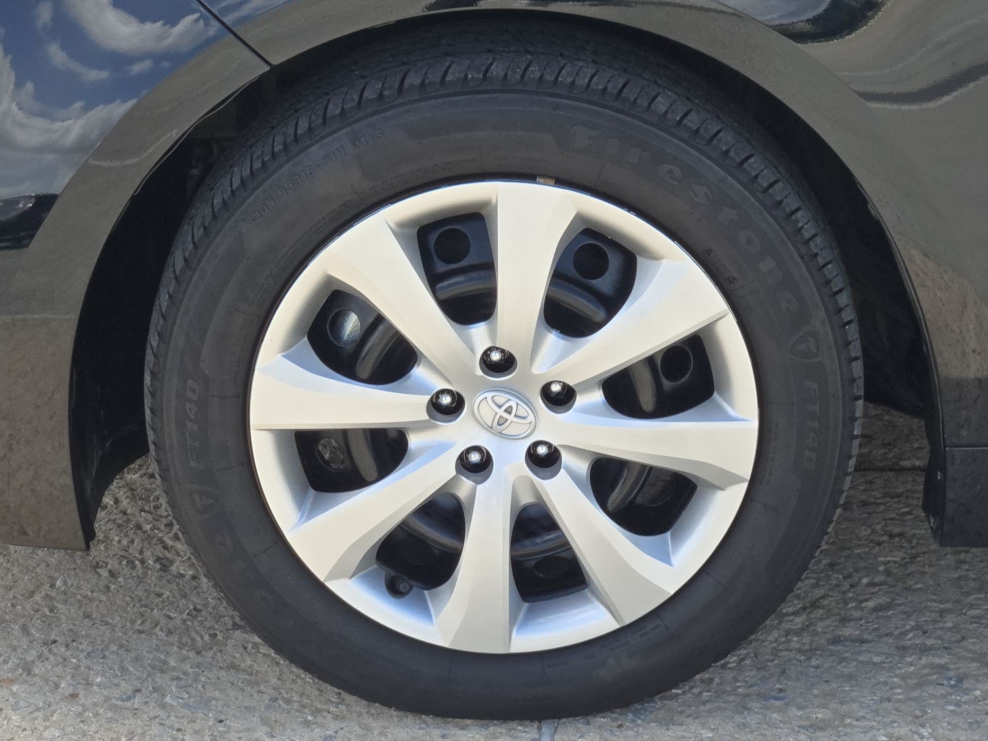 Used 2025 Midnight Black Metallic Toyota LE image 11