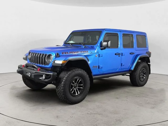 Used 2024 Hydro Blue Pearl Coat Jeep Rubicon X image 1