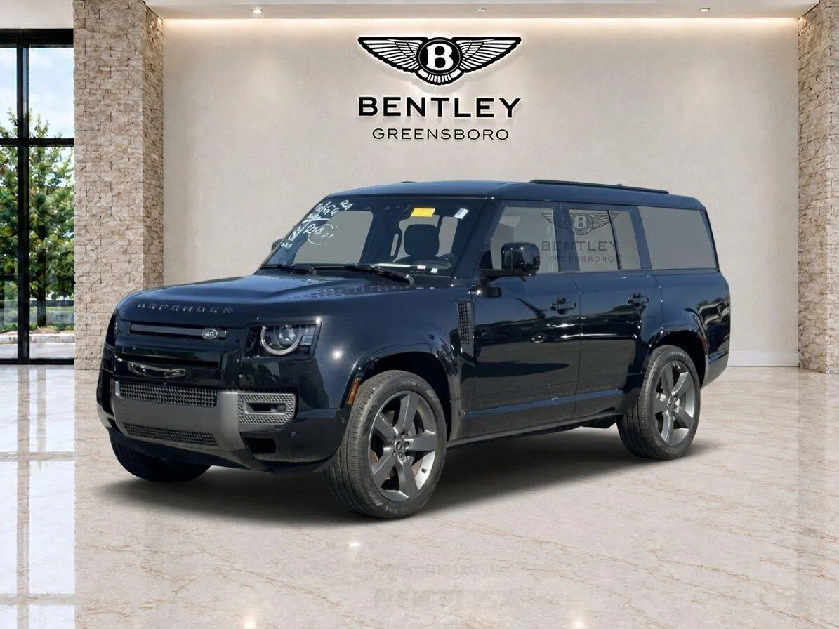 Used 2024 Santorini Black Metallic Land Rover Outbound image 1