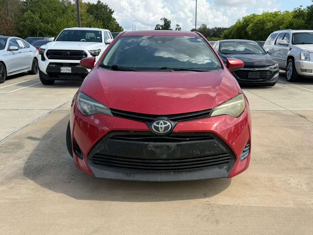 Used 2017 Barcelona Red Metallic Toyota LE image 9