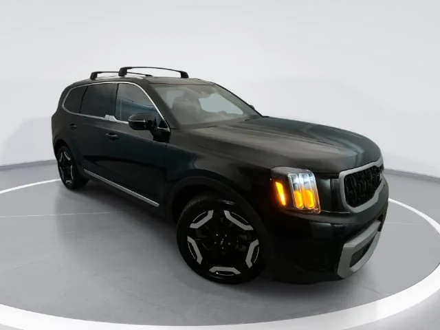 Used 2024 Black Kia EX image 1