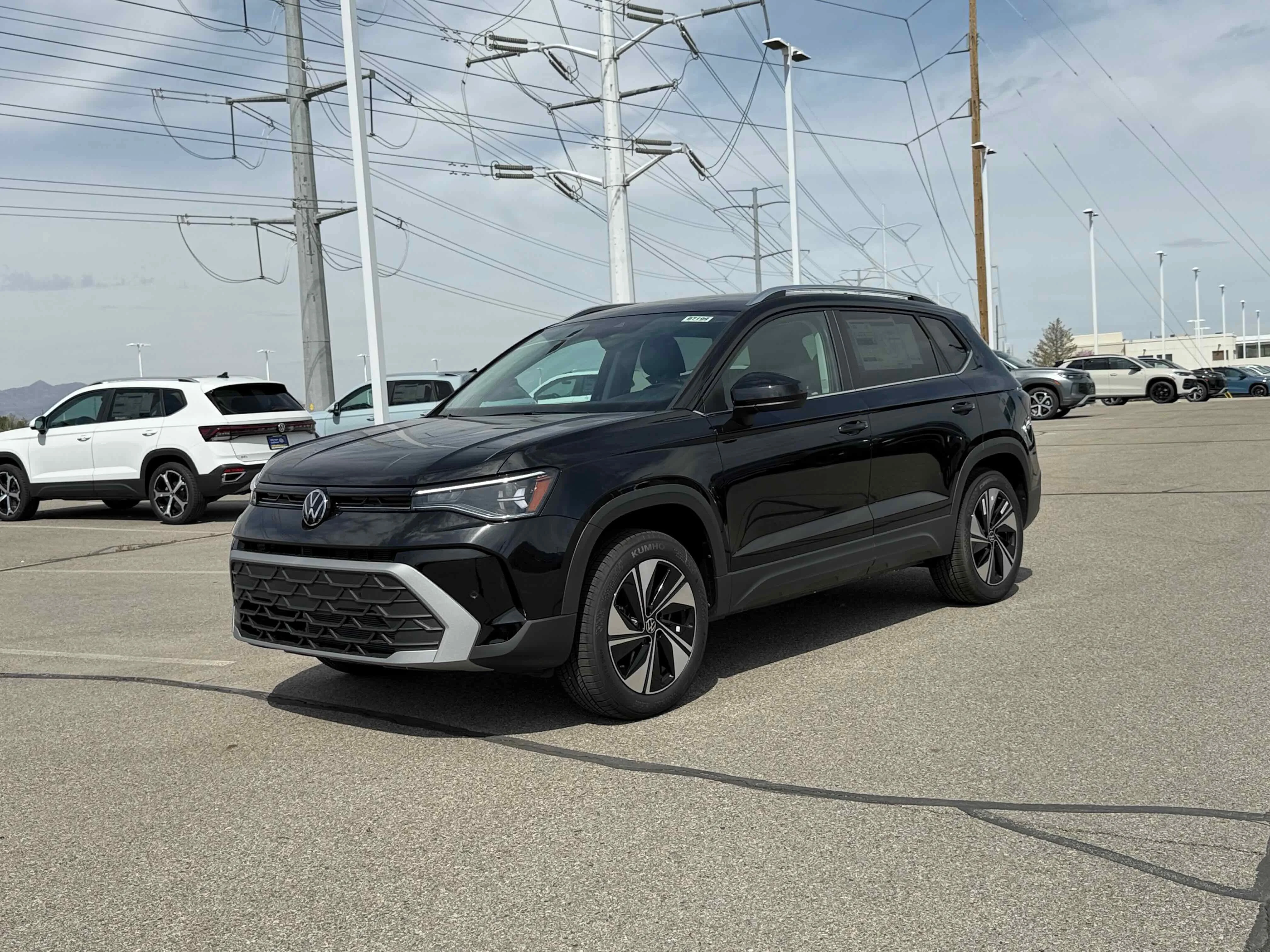 New 2026 Deep Black Volkswagen SE image 1