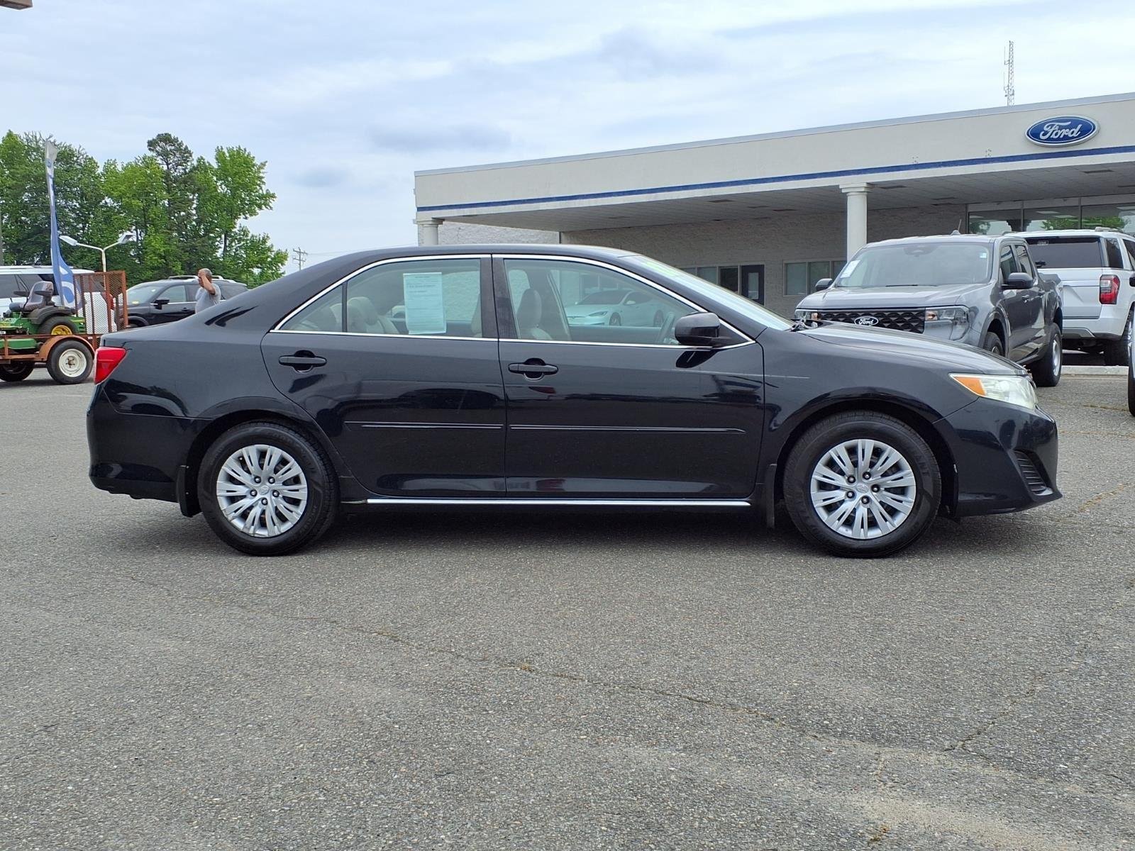 Used 2012 Attitude Black Metallic Toyota LE image 10