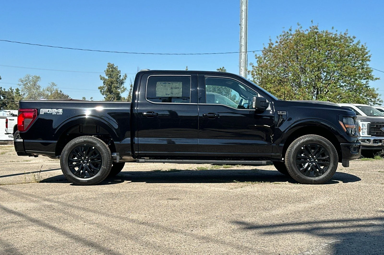 New 2026 Agate Black Metallic Ford XLT image 3