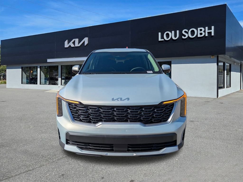 New 2026 Ivory Silver Kia LX image 8