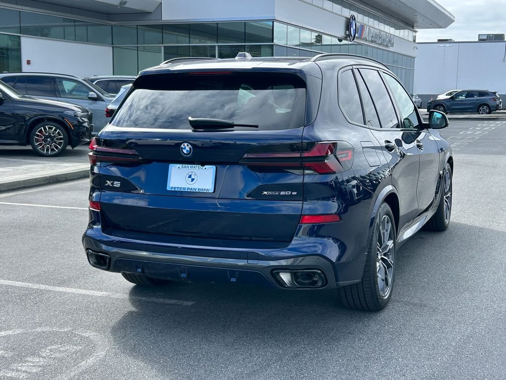 New 2026 Tanzanite Blue II Metallic BMW xDrive50e image 5