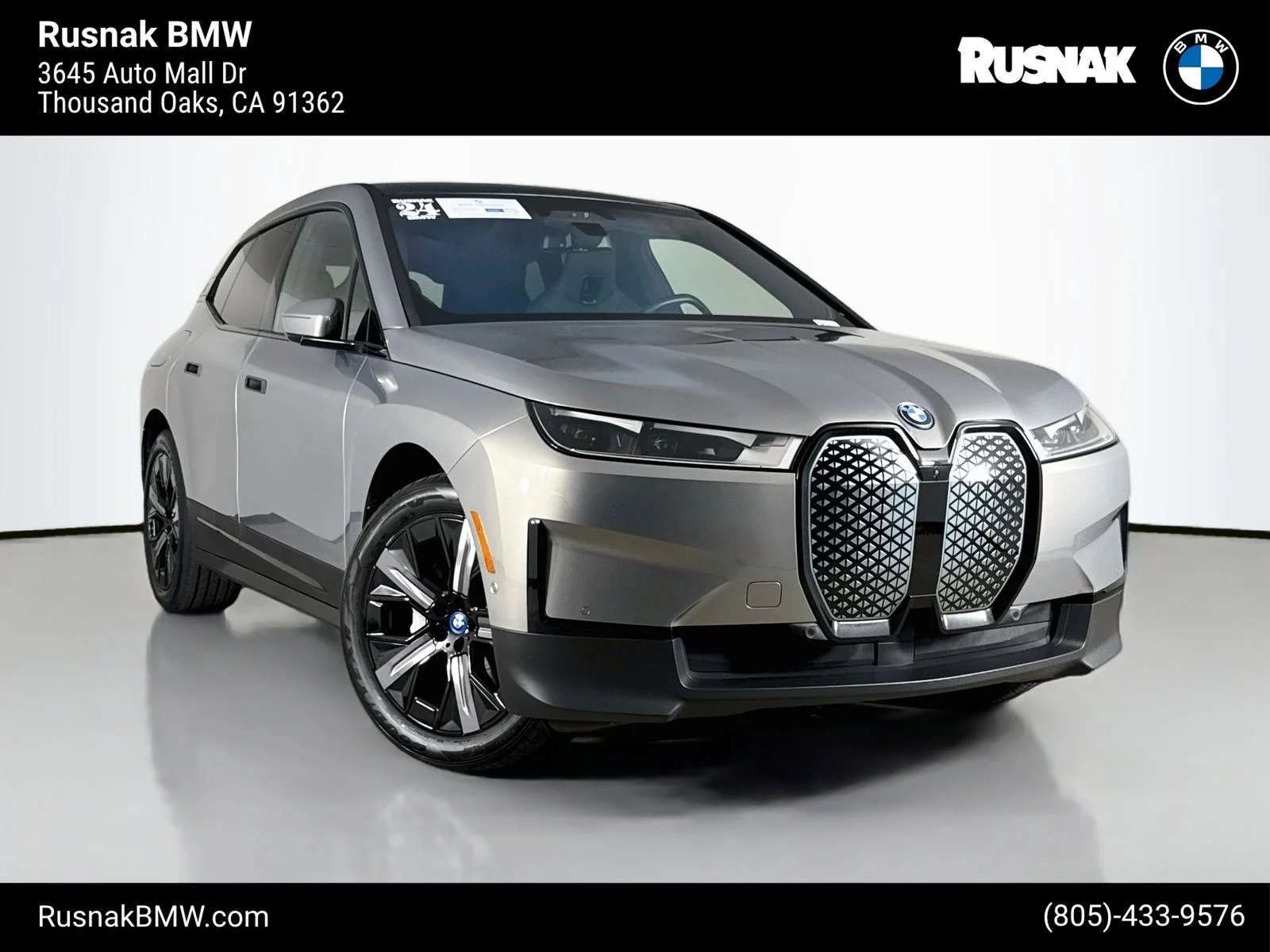 Certified Used 2024 Oxide Gray Metallic BMW xDrive50 image 1