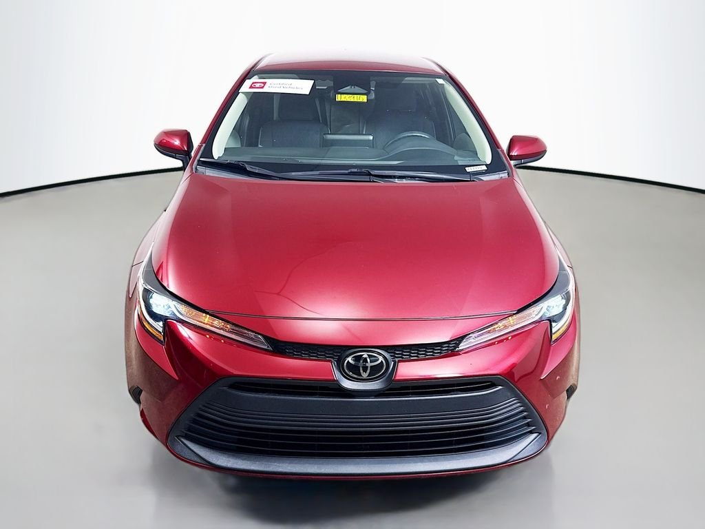 Used 2023 Ruby Flare Pearl Toyota LE image 2