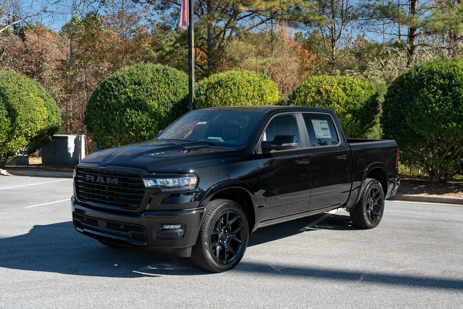New 2026 Diamond Black Crystal Pearl-Coat Exterior Paint RAM Laramie image 3