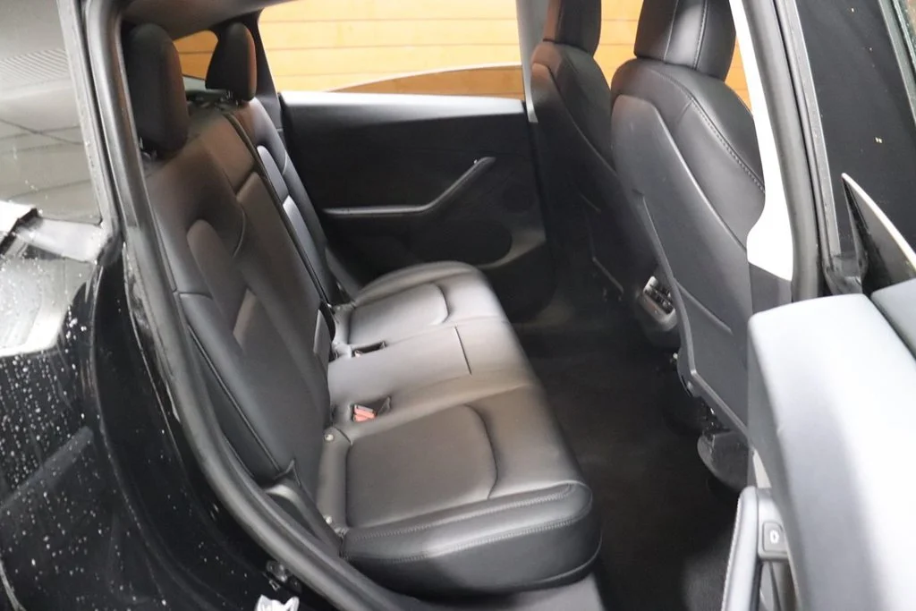 Used 2022 Solid Black Tesla Performance image 57