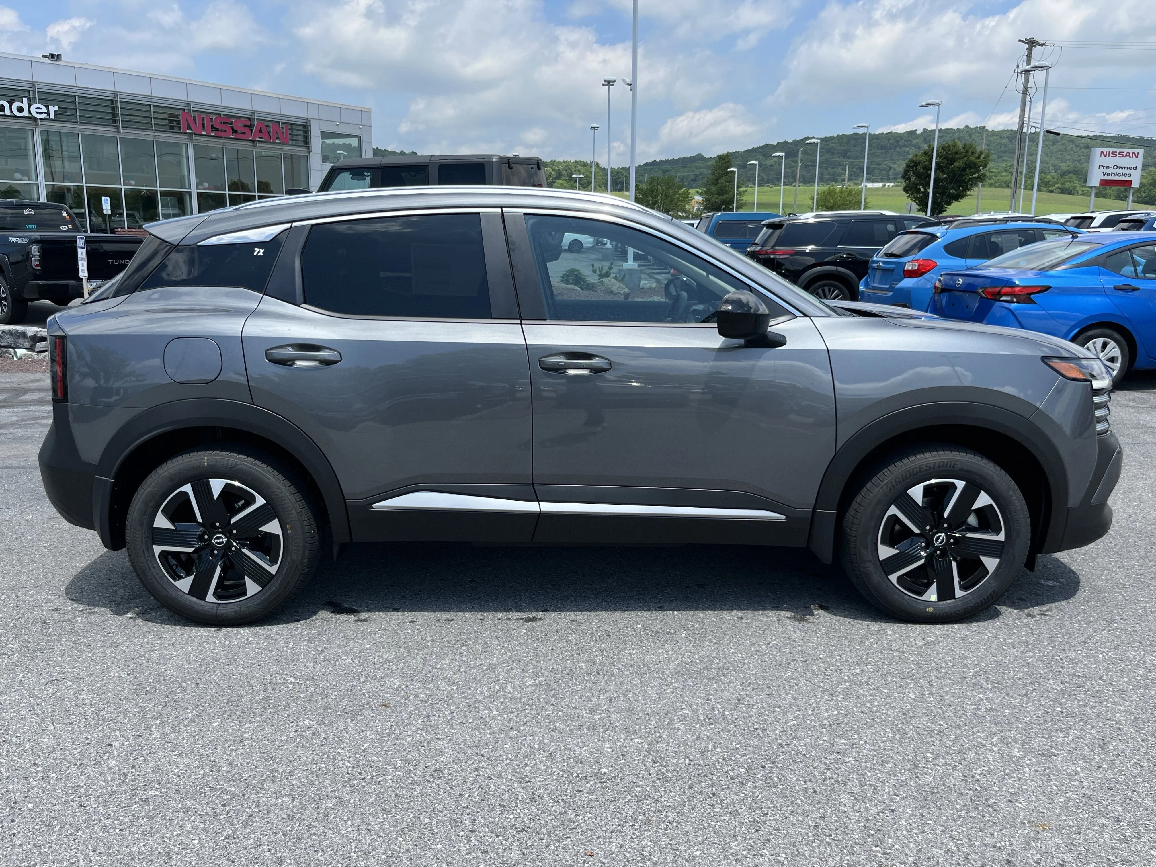 New 2026 Gun Metallic Nissan SV image 2