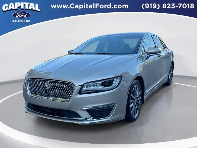 Used 2017 Gold Lincoln Premiere image 1