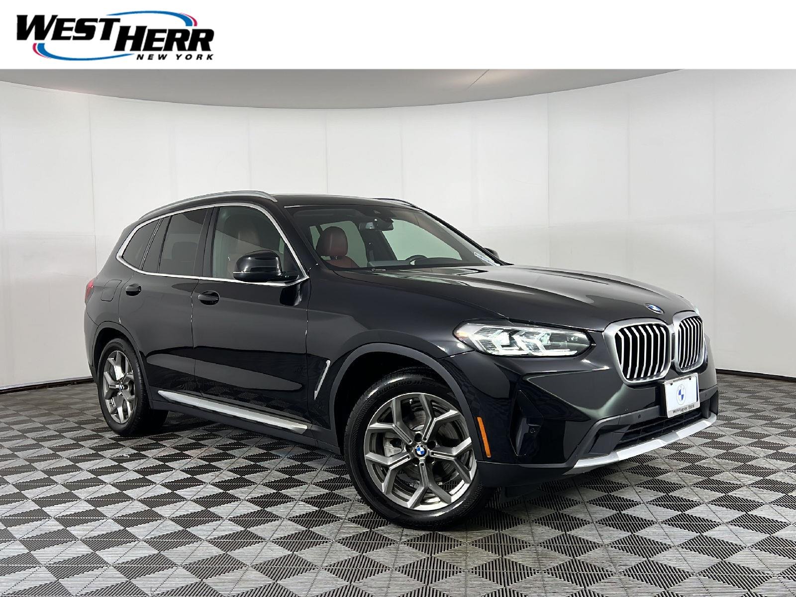 Used 2022 Black Sapphire Metallic BMW xDrive30i image 1
