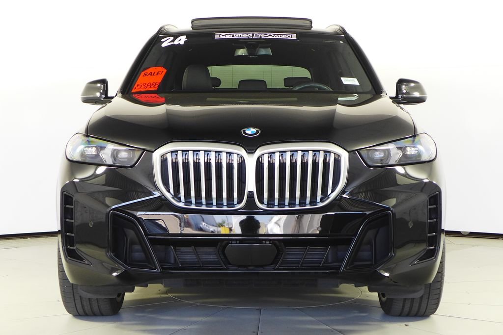 Certified Used 2024 Black Sapphire Metallic BMW sDrive40i image 3