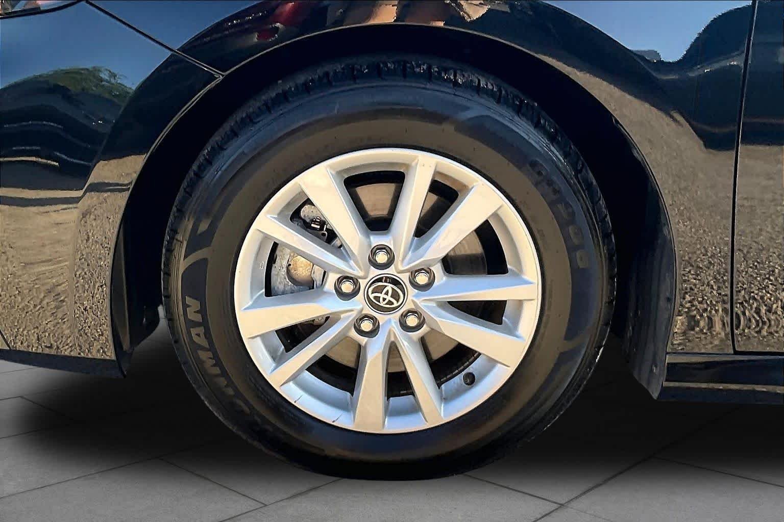 Used 2025 Midnight Black Metallic Toyota LE image 11