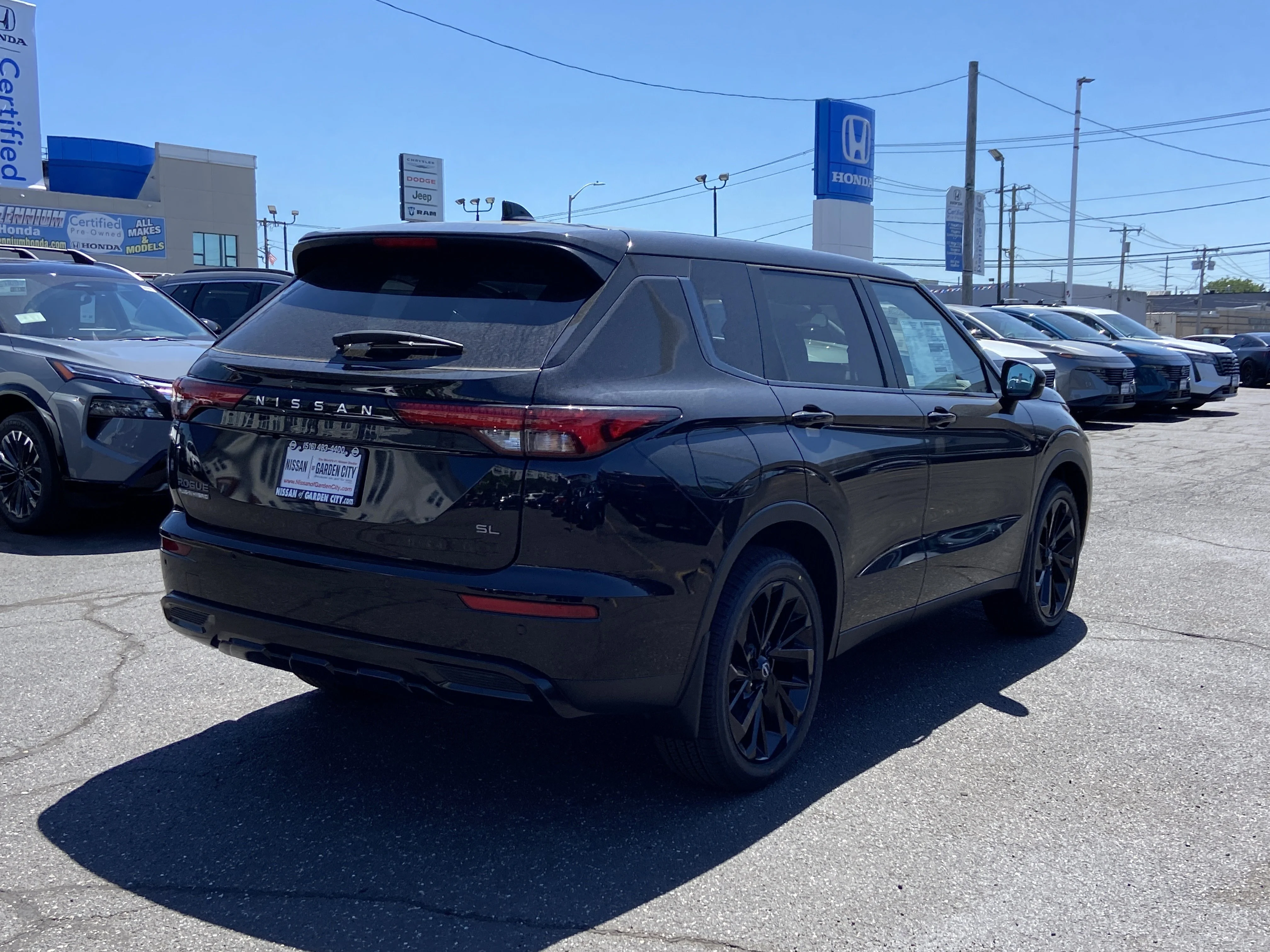 New 2026 Cosmic Black Nissan SL image 6