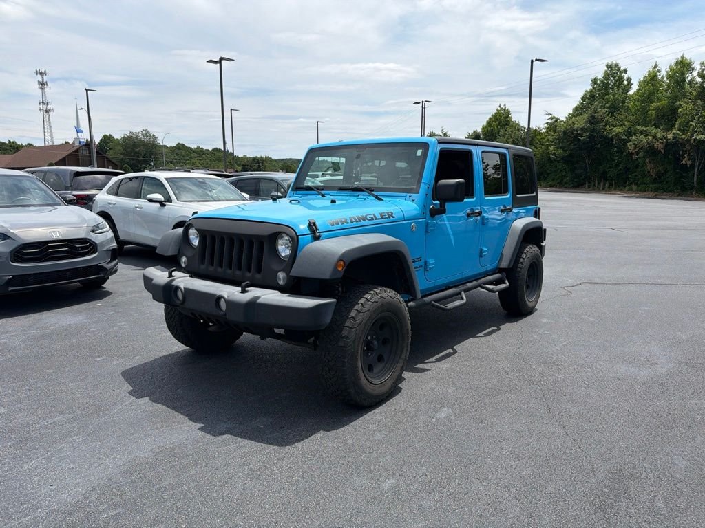 Used 2017 Blue Jeep Unlimited Sport image 1