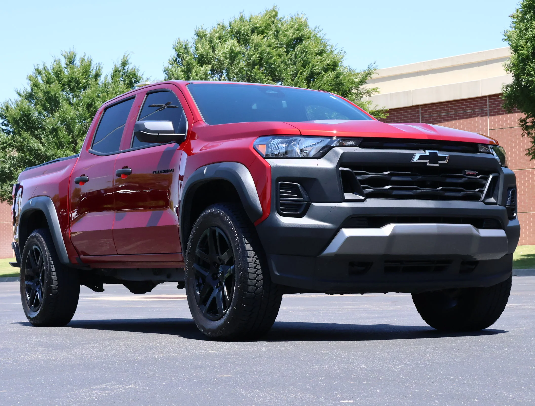 Used 2025 Radiant Red Tintcoat Chevrolet Trail Boss image 1