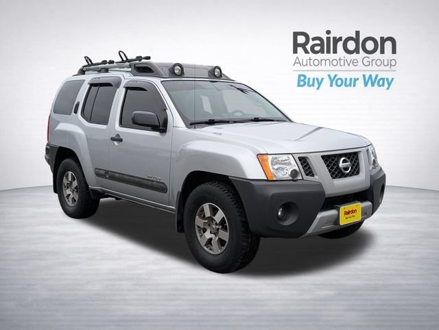 Used 2010 Silver Lightning Metallic Nissan Off-Road image 1