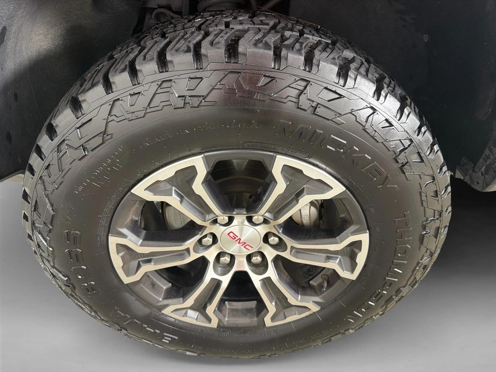 Used 2024 Sterling Metallic GMC 4WD AT4 image 11