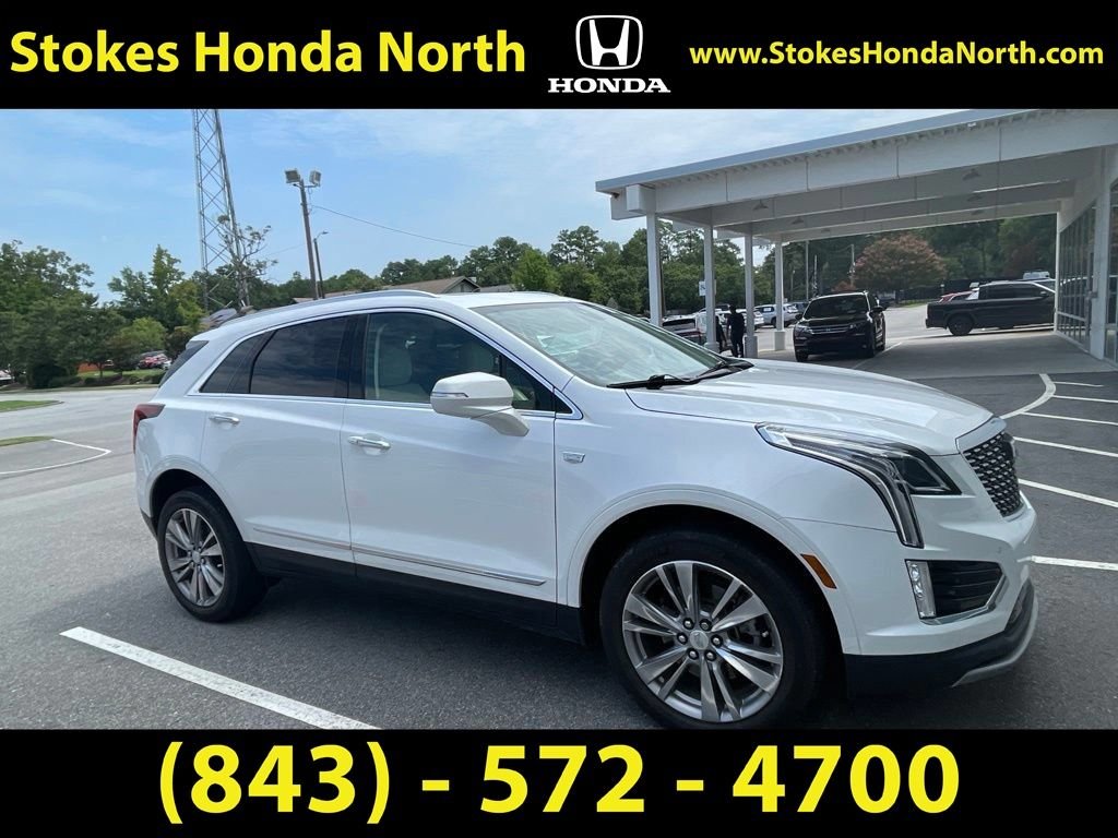 Used 2023 White Cadillac Premium Luxury image 1