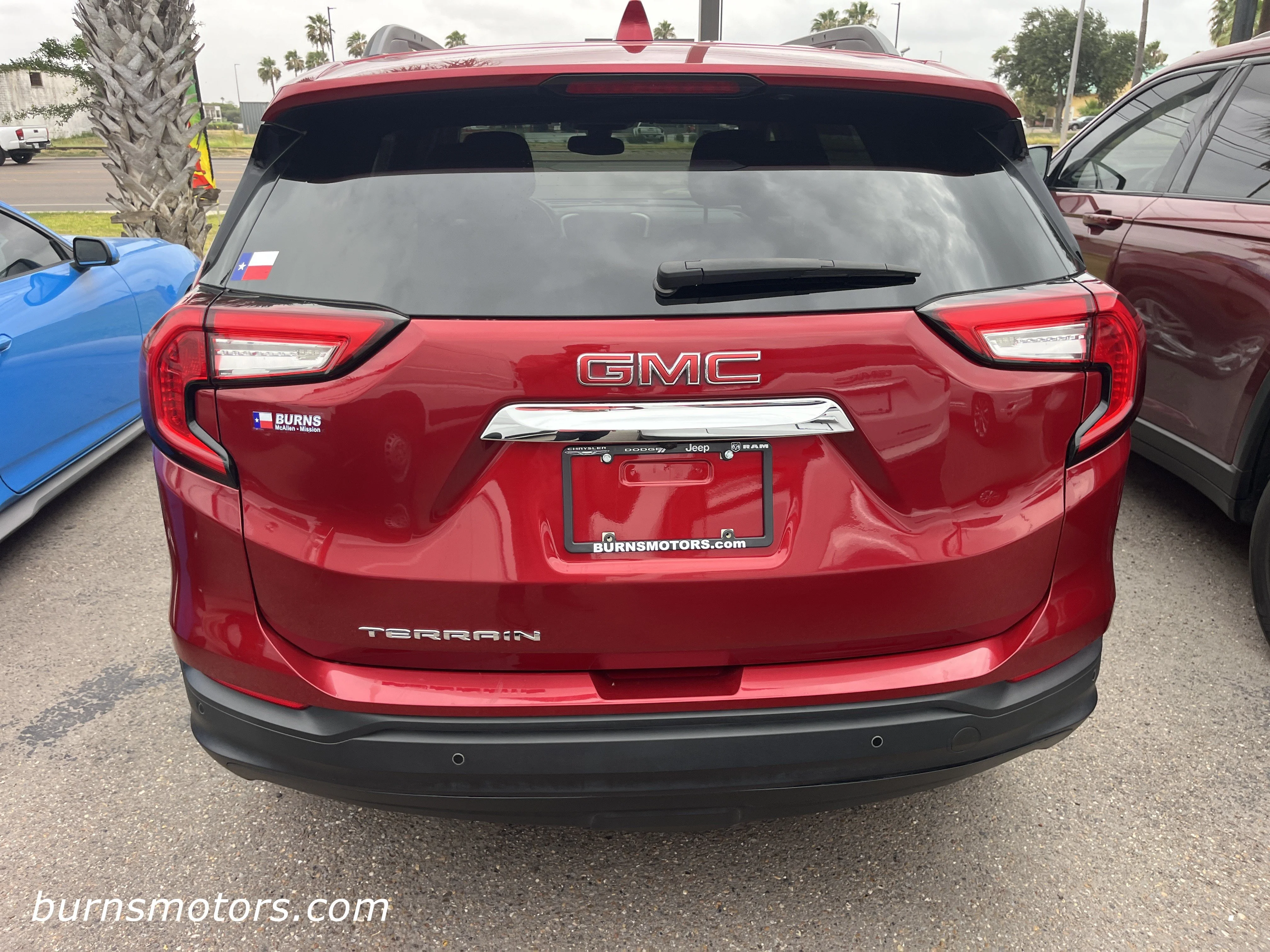 Used 2024 Volcanic Red Tint GMC SLE image 6
