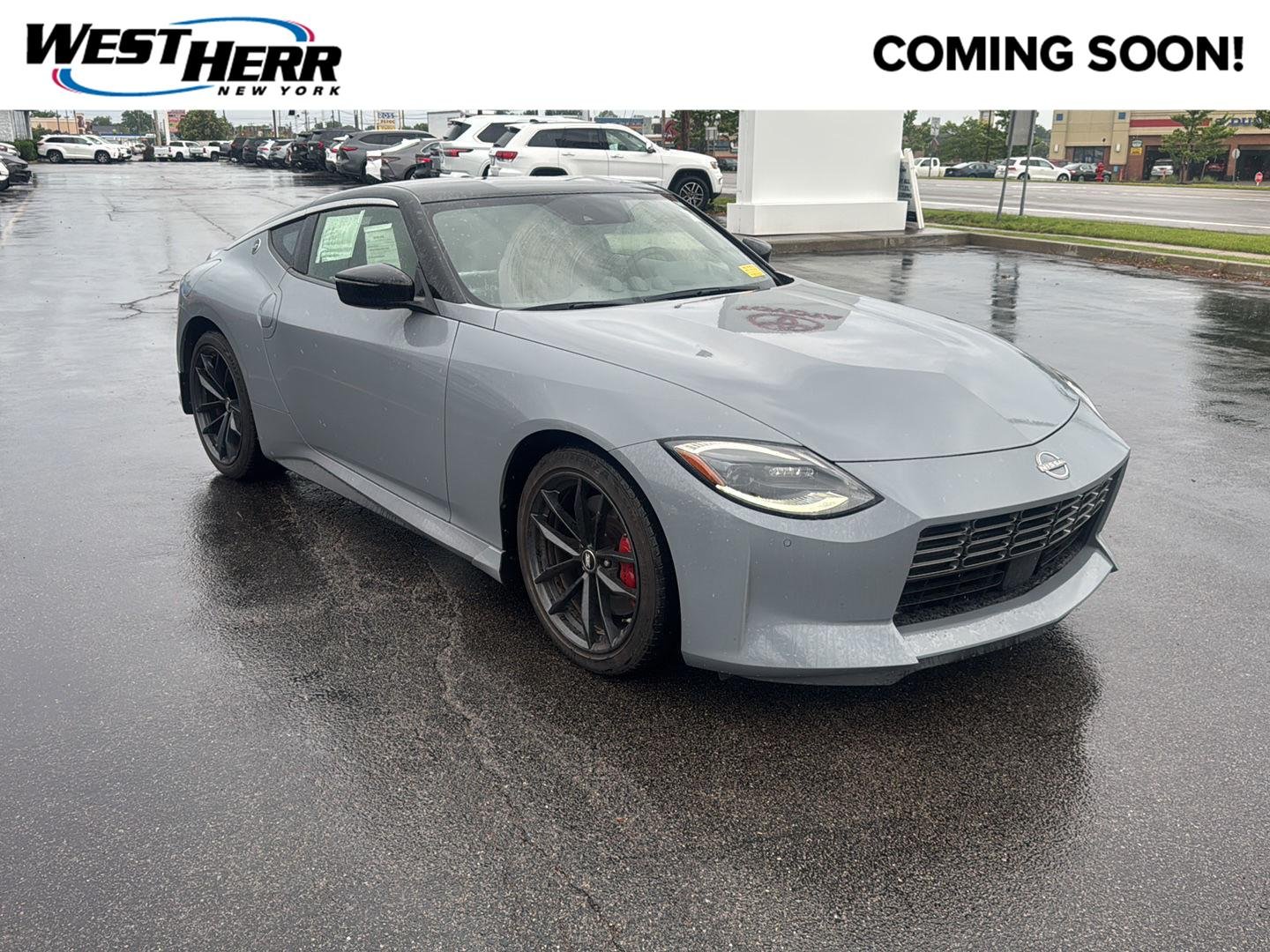 Used 2024 Boulder Gray/Super Black Nissan Performance image 1
