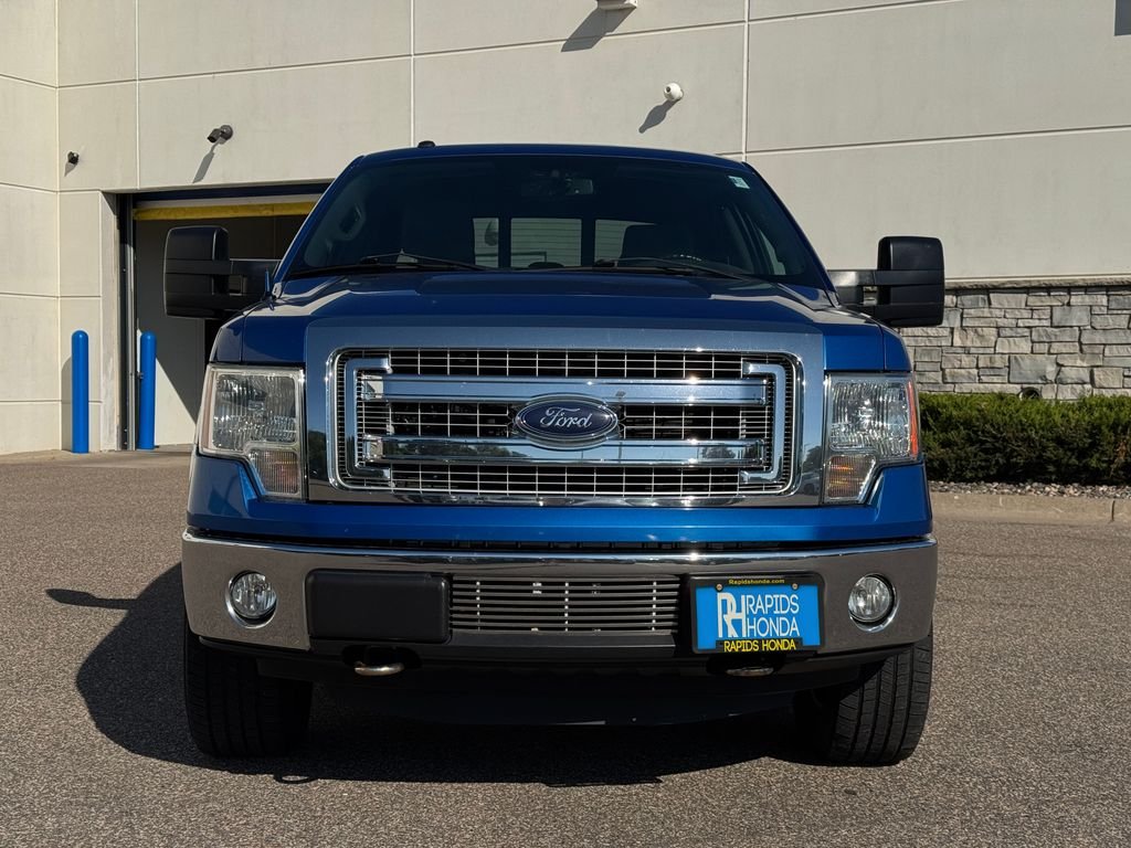 Used 2013 Ford F-150 XLT with VIN 1FTFW1ET9DKG50876 for sale in Coon Rapids, Minnesota