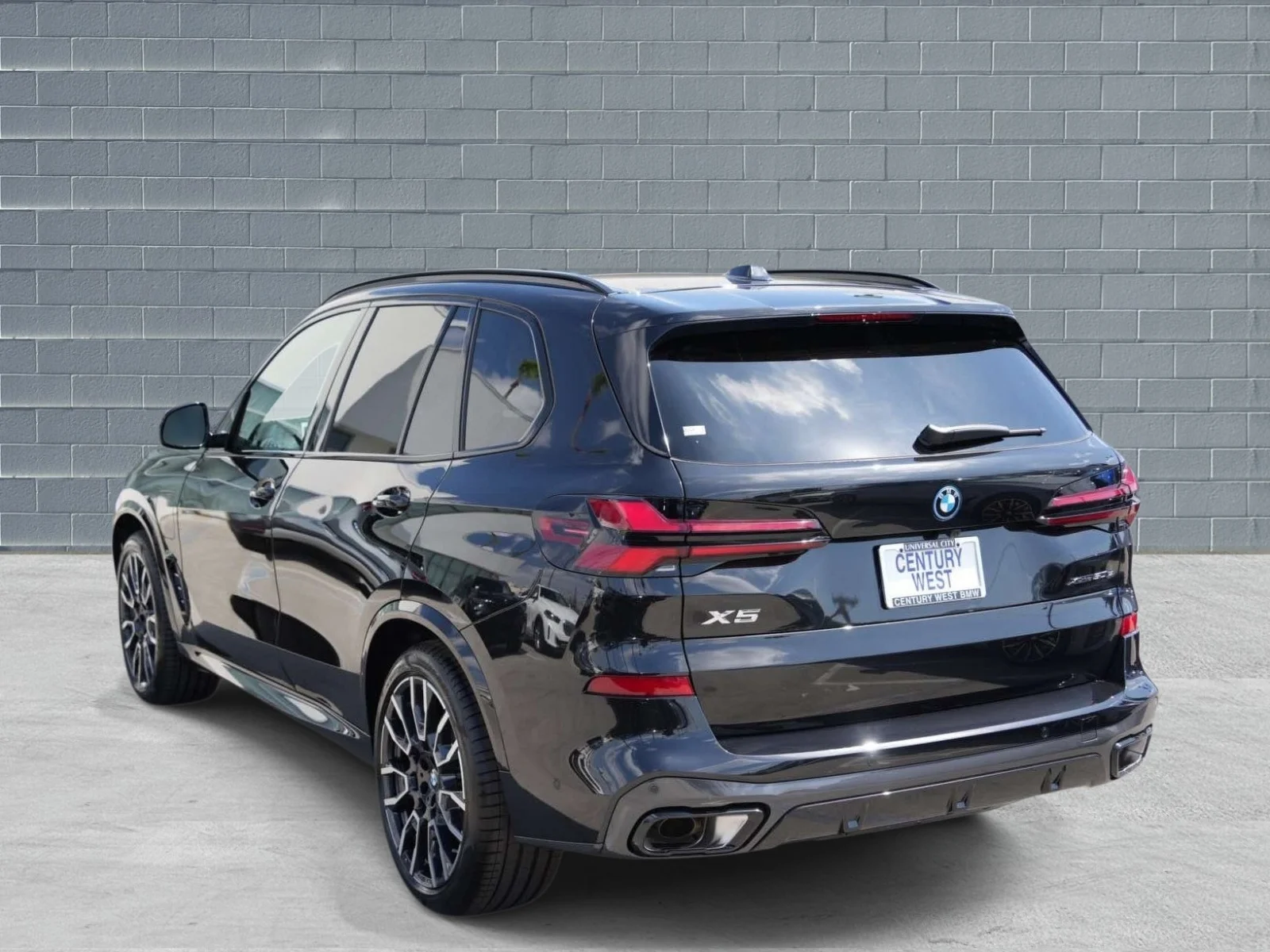 New 2026 Black Sapphire Metallic BMW xDrive50e image 3