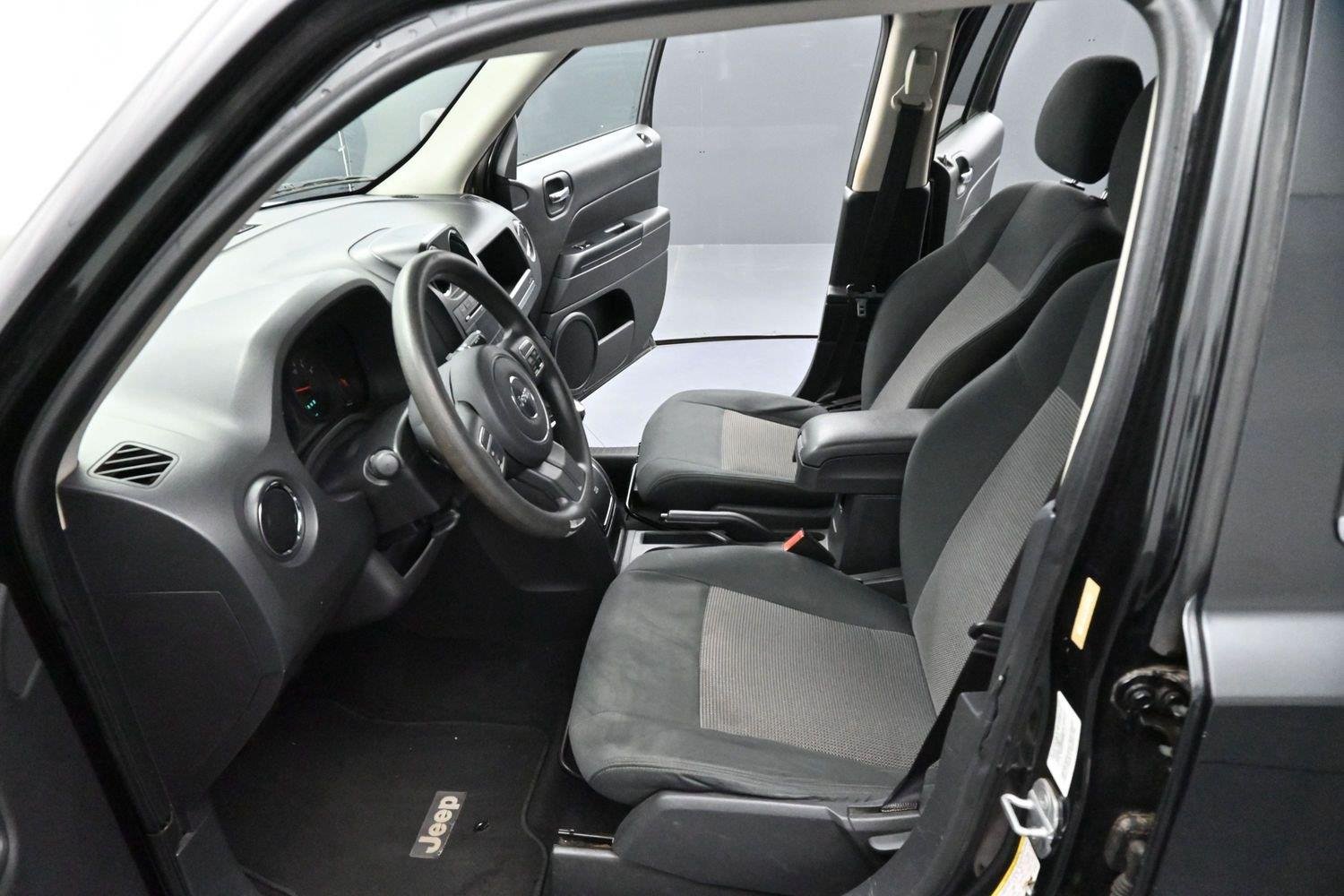 Used 2011 Brilliant Black Crystal Pearl Jeep Sport image 11