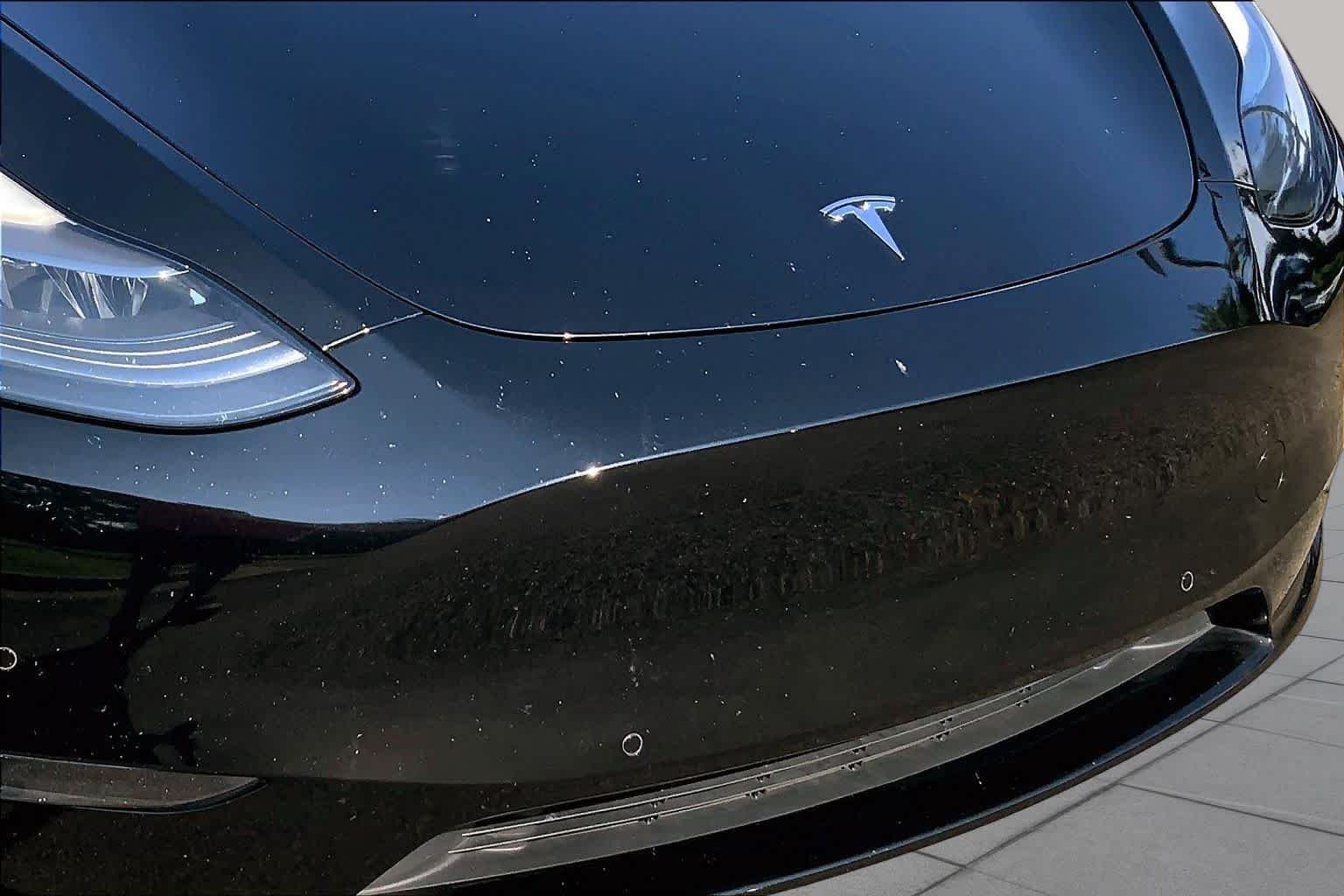 Used 2021 Solid Black Tesla Performance image 29