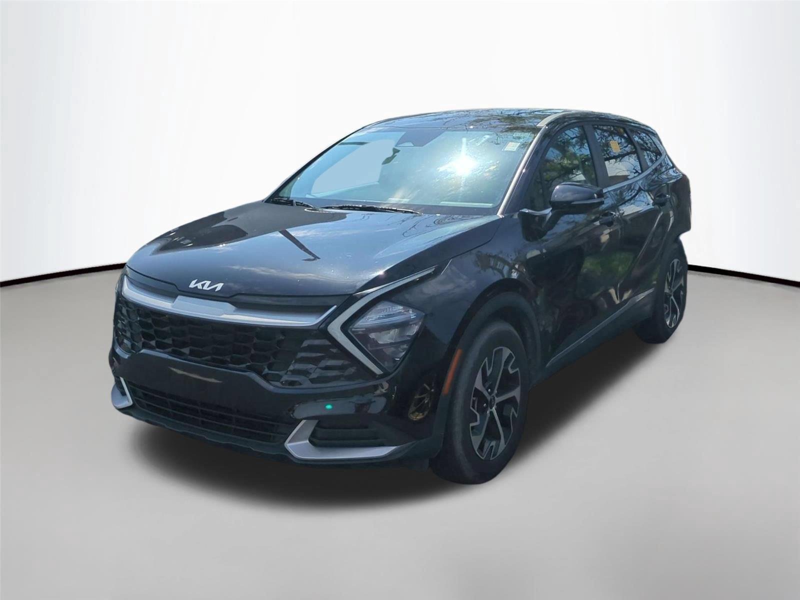 Used 2023 Ebony Black Kia EX image 1