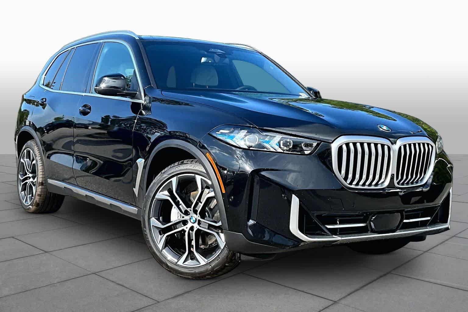 New 2026 Black Sapphire Metallic BMW xDrive40i image 2